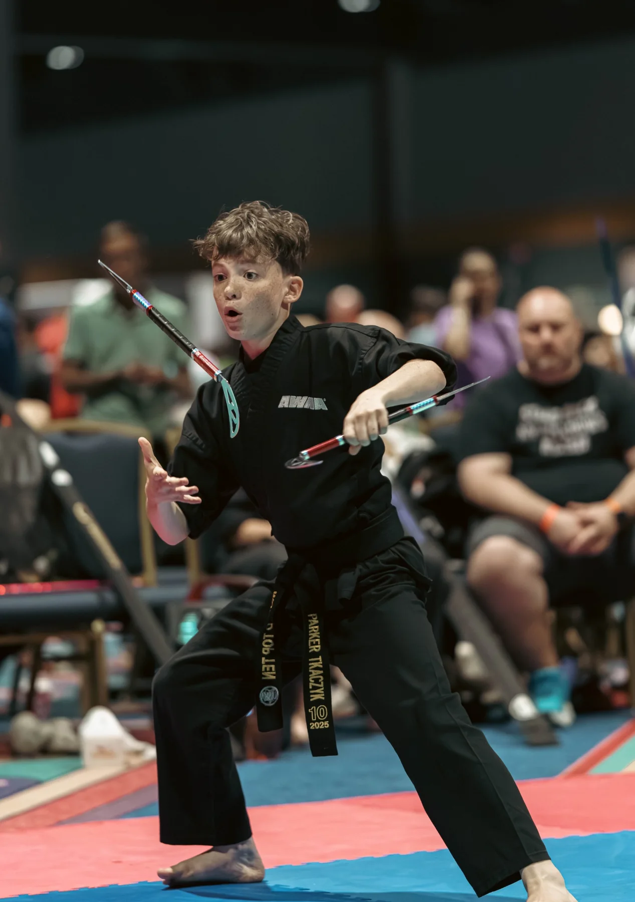 Parker performing a traditional weapons routine